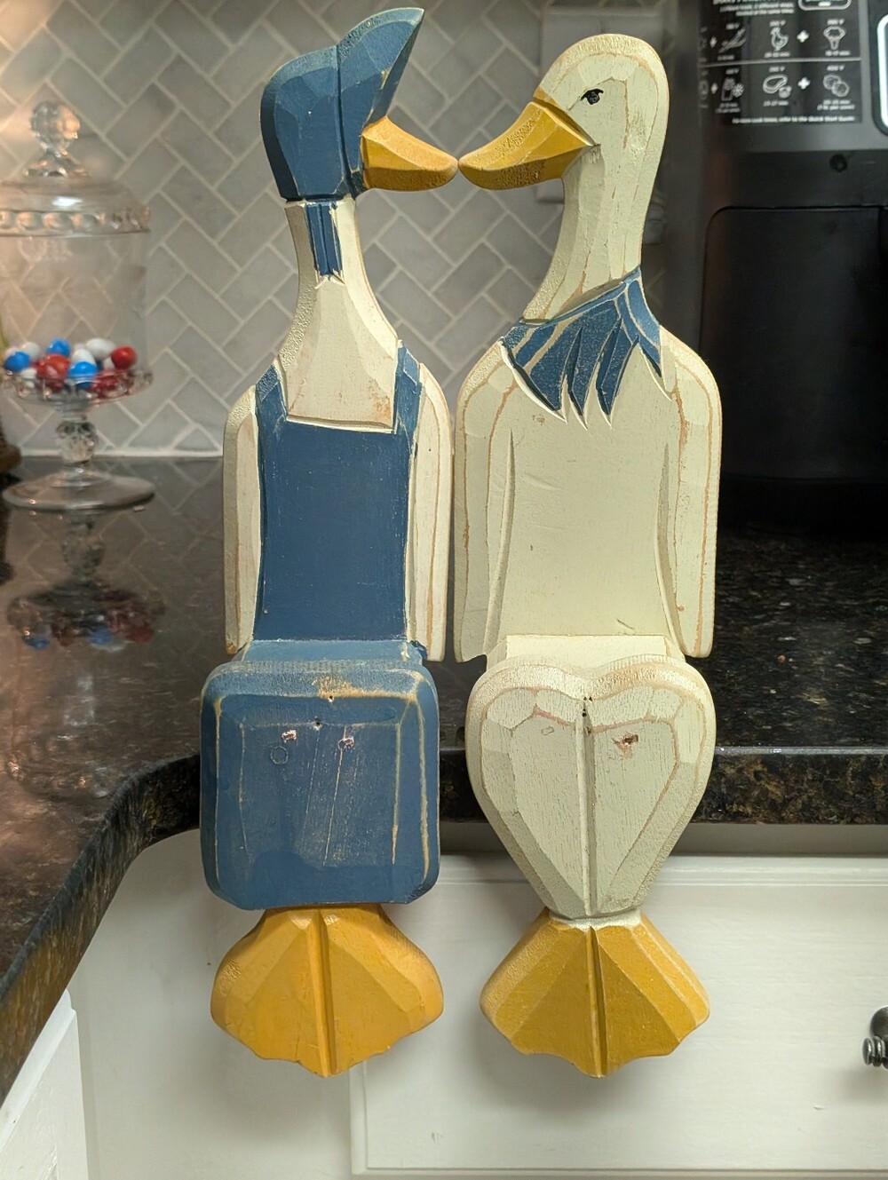 hand-carved wooden Kissing Geese With dangling legs